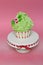 Giant cupcake with green frosting