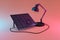 giant desk lamp shining light on solar panel on infinite colorful background renewable unlimited green energy concept 3D