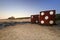 Giant dice, Bamburgh Castle, Northumberland Coast, England. Sunset.