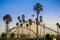 The Giant Dipper Roller coaster in Santa Cruz Beach Boardwalk amusement park at sunset, Californi