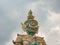 Giant The front of gate with Cloud sky in Wat phrakaew Temple Bangkok city