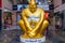 Giant golden mascot of a Yeti, a mythical creature, sits at the entrance of a mall. Yeti mascot is chosen for the promotion of