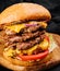 Giant hamburger fast food cutlet on wooden board