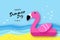 Giant inflatable pink flamingo in paper cut style. Origami Pool float toy on the sunny beach with sand and crystal clear