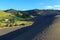 Giant inland sand dune at Bethells Beach, New Zealand