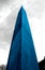 giant iron obelisk in blue