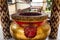 Giant joss stick pot with red incense stick at Chinese temple