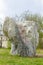 A giant landscaping rock in a park.