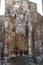 A giant masoned standing Buddha statue without head in a temple in the royal ancient city of Polonnaruwa in Sri Lanka