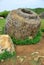 Giant megalithic stone urns at the Plain of Jars archaeological site in Loas.