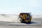 Giant mining dump truck, after being discharged from the conveyor, is tested at the factory test site.