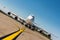 Giant modern civil passenger airliner at airport. Front view of the aircraft. Unique perspective. Summer travel concept