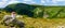 Giant Mountains, mountain panorama from the hiking trail to the top of Sniezka. View of the vast mountain slopes and trails