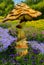 Giant Mushroom amongst flowers