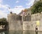 Giant Pippi Longstocking doll on the wall of the fortress of Old Town of Kotor on the eve of XXV Kotor Festival of Theatre for Chi