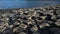 Giant`s Causeway lies at the foot of the basalt cliffs that line the sea coast on the northern shore of County Antrim, Northern