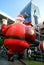 Giant Santa balloon at overpass bridge