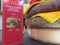 A giant sized model display of a McDonalds Double Quarter Pounder hamburger with cheese
