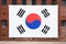 Giant South Korean flag on the red bricks wall of Seodaemun prison hall a former Japanese prison in Seoul Korea