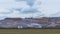 Giant spreader or absetzer machinery. A large dumper on a landfill with potash ore. Extracting potassium salts.