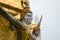 Giant Statue Surround The Basement of Grand Gold Stupa Is One of Landmark of Wat Phra Kaew Monastery, Bangkok of Thailand.