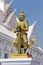 Giant statue torso green patterned gold