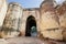 Giant stone fortress gates deserted in the morning