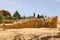 Giant Telamon, Atlas supporting statue of ruined Temple of Zeus in the Valley of Temples of Agrigento, Sicily, Italy. UNESCO World