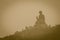 Giant Tian Tan Buddha statue on the peak of the mountain at Po Lin Monastery in Lantau Island, Hong Kong