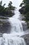 Giant Tiered Waterfall with Green Forest - Cheeyappara Waterfalls, Idukki, Kerala, India