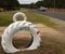 Giant tractor tyres make an impressive gateway to a country Victoria property