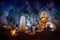 Giant underground cave in Asia with huge stalagmites, stalactites and buddha statue in the center of the hall