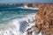 Giant waves hit the rocks, during a storm.