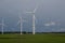 Giant wind turbines on a rural agricultural landscape