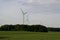 Giant wind turbines on a rural agricultural landscape