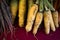 Giant yellow carrots at a farmers market