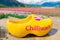 Giant yellow wooden clog for tourists to pose in at the Chilliwack Tulip Festival in Canada, on a real flower farm, with tulip