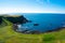 Giants Causeway Aerial view most popular and famous attraction in Northern Ireland.Hills on Coast of Atlantic ocean, summer time