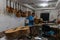 GIANYAR,BALI/INDONESIA-MAY 30 2019: The guitar craftsman are working on painting guitars in a classical guitar workshop owned by I