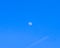 Gibbous moon in clear morning sky