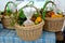 Gift baskets with vegetables stand on a table