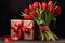 Gift with bow and tulips. Happy Valentines day and love decoration concept