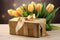Gift with bow and tulips. Happy Valentines day and love decoration concept