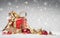 Gift Box and Baubles on Snow with falling Snowflakes - Christmas Background - Voucher