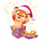 Gift box with cute tiger in christmas hat leap out