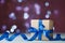 Gift box or present against festive bokeh background. Holiday greeting card for Christmas, New Year or birthday.