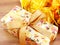 Gift box present and artificial flowers bouquet background yellow theme