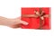 Gift box with ribbon female hand