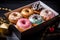 A gift box of various glazed donuts. Promotional commercial photo.