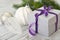 Gift box with violet ribbon